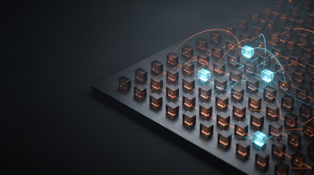 Una griglia di piccoli cubi su una superficie scura, con alcuni elementi illuminati di azzurro e linee di connessione.